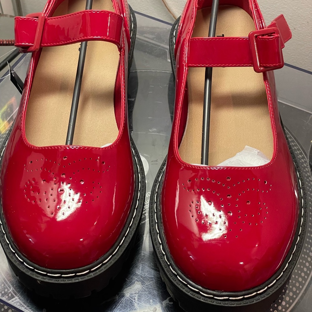Chunky cherry-red patent Mary Jane loafers . 12W